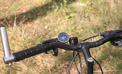 Fototapeta na wymiar round compass on bicycle wheel