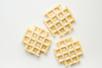 Confectionery products. Waffles on a white background. Soft waffles on a white background.