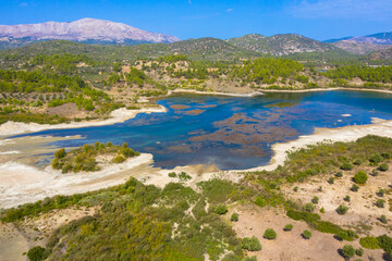 Fototapeta premium Aerial view of Gadouras Dam. Solving the important and crucial water supply problems. Near the villages of Lardos and Laerma in the southern part of the island. Rhodes, Greece.