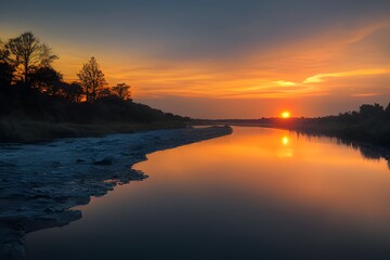 Obraz premium A beautiful and tranquil sunset over a river. 