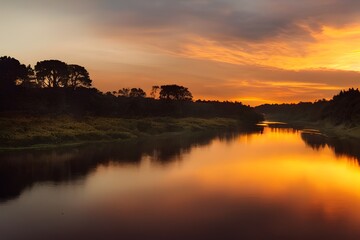 Obraz premium A beautiful and tranquil sunset over a river. 