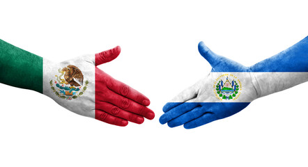 Handshake between El Salvador and Mexico flags painted on hands, isolated transparent image.