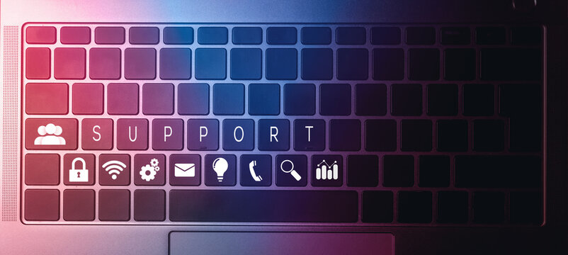 Top view of laptop keyboard with contact us or customer support hotline people connect. Feedback, business and finance concept.