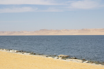 View of the Qarun LakeShore with a mountains and Clear Sky