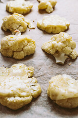 Baked cauliflower with cheese on baking sheet