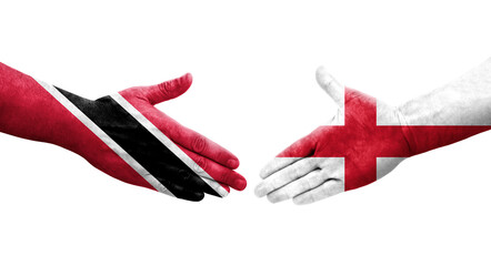 Obraz premium Handshake between England and Trinidad Tobago flags painted on hands, isolated transparent image.