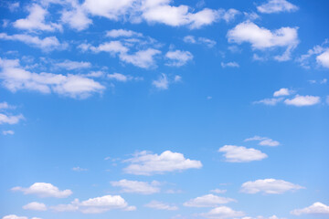 Naklejka na ściany i meble Blue sky with picturesque clouds