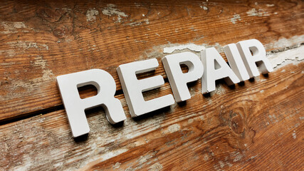 Repair - Word on shabby wood