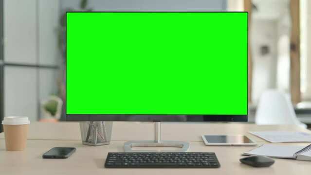 Desktop Computer with Green Screen in Office, Zoom in