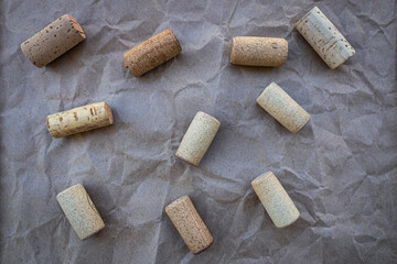 wine corks on wrinkled brown paper