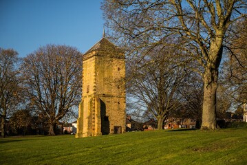 Fototapeta premium Historic stone fortress tower in Abington Park, Northampton