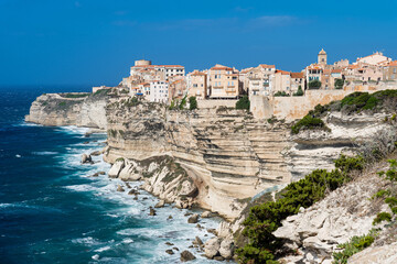Fototapeta na wymiar Old town of Bonifacio, built on cliff rocks. Corsica, France.