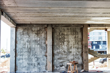 Construction of a monolithic concrete building. Modern monolithic construction. Reinforced concrete walls. Reinforced concrete wall.