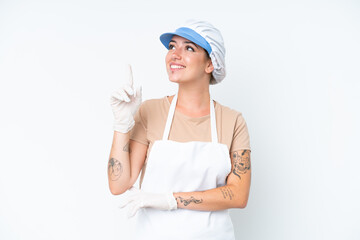 Fishmonger wearing an apron and holding a raw fish isolated on white background pointing up a great idea