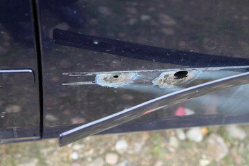 Car grinded door corrosion under molding .