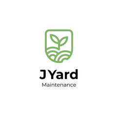 clean yard or garden logo with green soil and plant symbol emblem logo