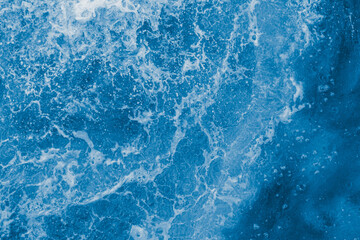 Dark blue sea surface with waves, splash - 538576920