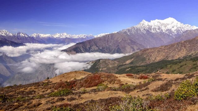 Nature 4K Timelapse Himalyas mountains peaks. Higher than clouds point of view - Moving under the feet