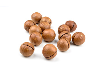 a handful of macadamia nuts on white background isolate