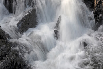 Fototapeta na wymiar Fast waterfall in a remote region of Maine