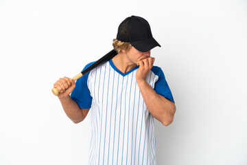 Young blonde man playing baseball isolated on white background having doubts