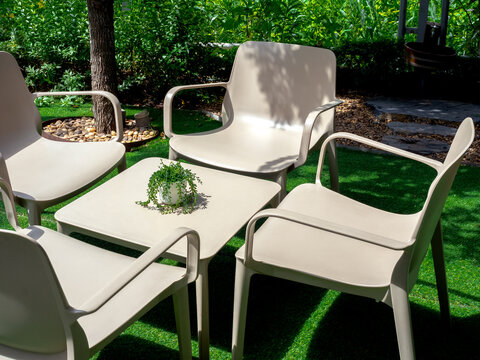white plastic,allibert,retro Allibert garden patio table 4 chairs floral parasol & base 