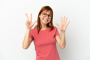 Redhead girl isolated on white background counting eight with fingers