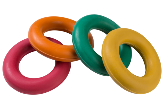 Four colored carpal expanders, lie one on top of the other, on a white background, concept, isolate