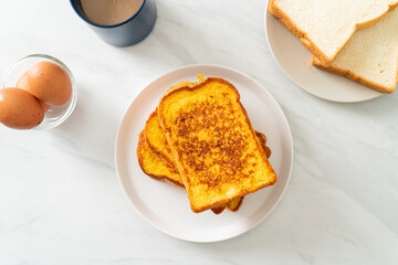 french toast on white plate