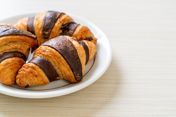 fresh croissant with chocolate