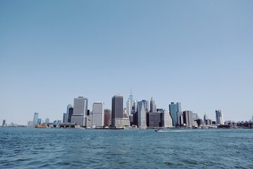 Naklejka premium Manhattan Island, City Brooklyn Bridge in New York, View of the Brooklyn Bridge with lower Manhattan in the distance. USA