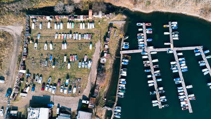 The boat station is on top. A lot of motorboats on the water, taken from above