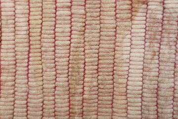White brown wool yarn cloth background. Surface of fabric texture in white winter color. 
