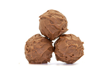 Obraz premium Chocolate praline. Milk chocolate isolated on white background. close up