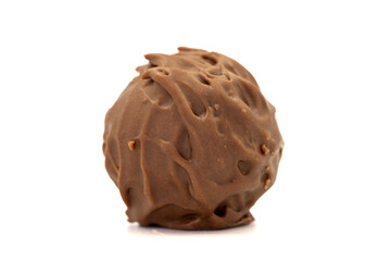 Chocolate praline. Milk chocolate isolated on white background. close up