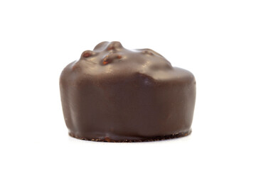 Chocolate praline. Dark chocolate isolated on a white background. close up