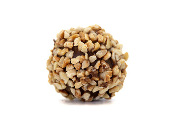 Chocolate praline. Chocolate with hazelnut isolated on white background. close up