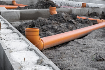 New Installed pipework system. Sewer Line developed and mounted on the construction site. New...