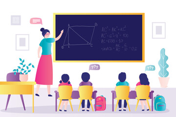 Teacher explains mathematical problems to younger grades. Students listen to solution of problem written on blackboard