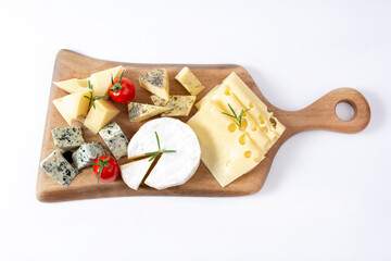 Assorted cheeses, different cheese types, isolated on white background