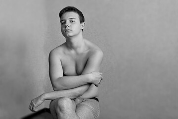 Beautiful artistic portrait of a young nude male model