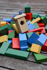 Obraz na płótnie Canvas a lot of colorful wooden blocks. wooden toys for children in kindergarten.