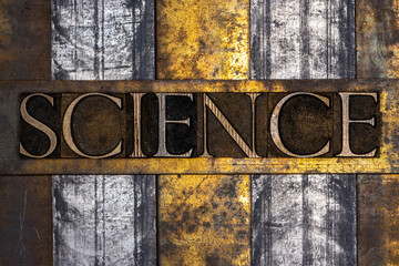 Science text on grunge textured copper and gold background