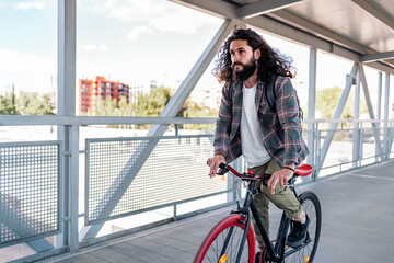 Hipster Man Riding Bike