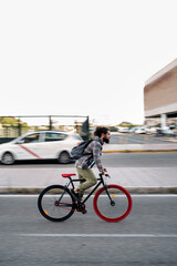 Bearded Man Riding his Bike