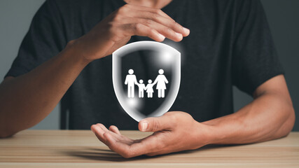 Man with protective gesture and family, life, health and house insurance icons. Family life...