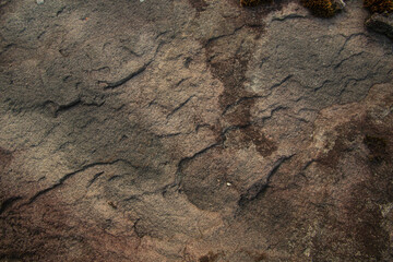 Background of stone surface, stratified rock texture.