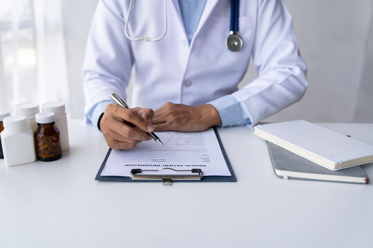 The doctor has written a prescription. and treatment details Medicines used for patients.