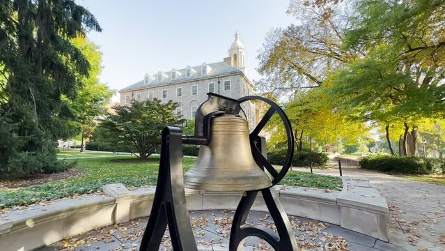 UNIVERSITY PARK, PA - Circa October, 2022 - A tracking shot of the old bell near Old Main on Penn State's campus. This bell was replaced with a newer model in 2009.  	