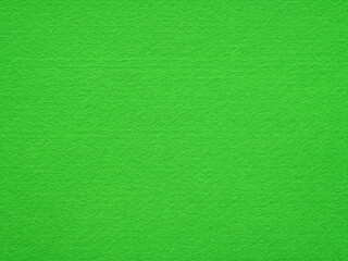 Naklejka na ściany i meble Green felt background texture. Surface of snooker or poker table. Natural felt for patchworkor or other artwork. Full frame background texture pattern of art and stationery material in bright color.